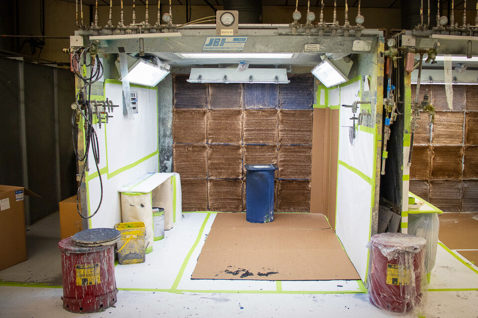 A photo of an empty coating booth.