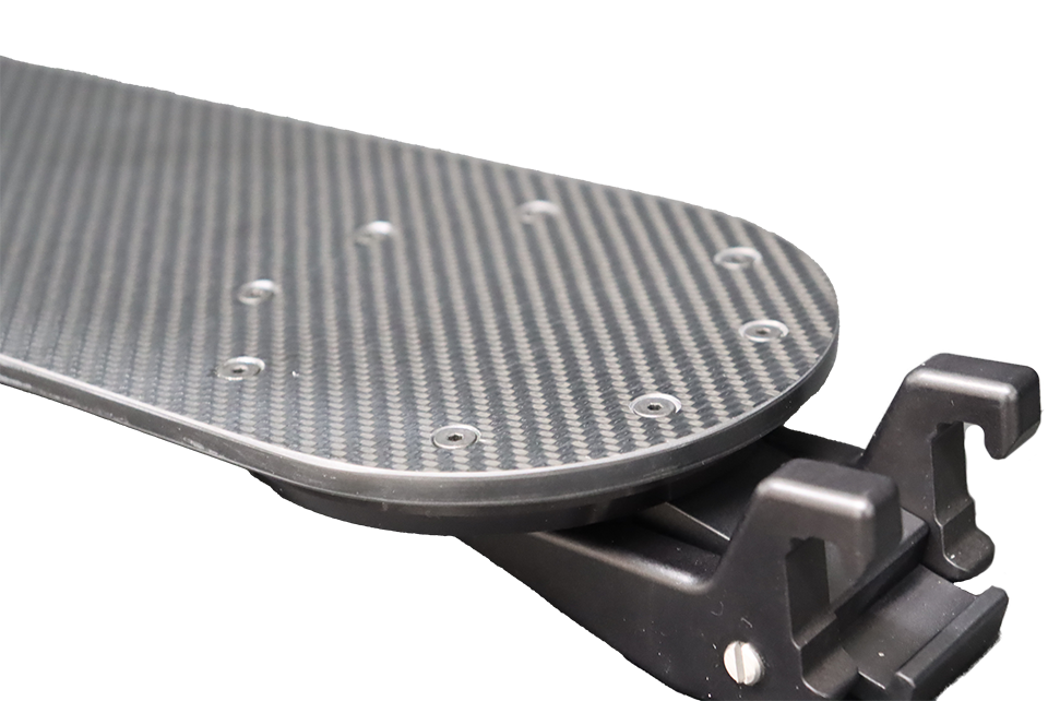 A carbon fiber armboard for a surgical table