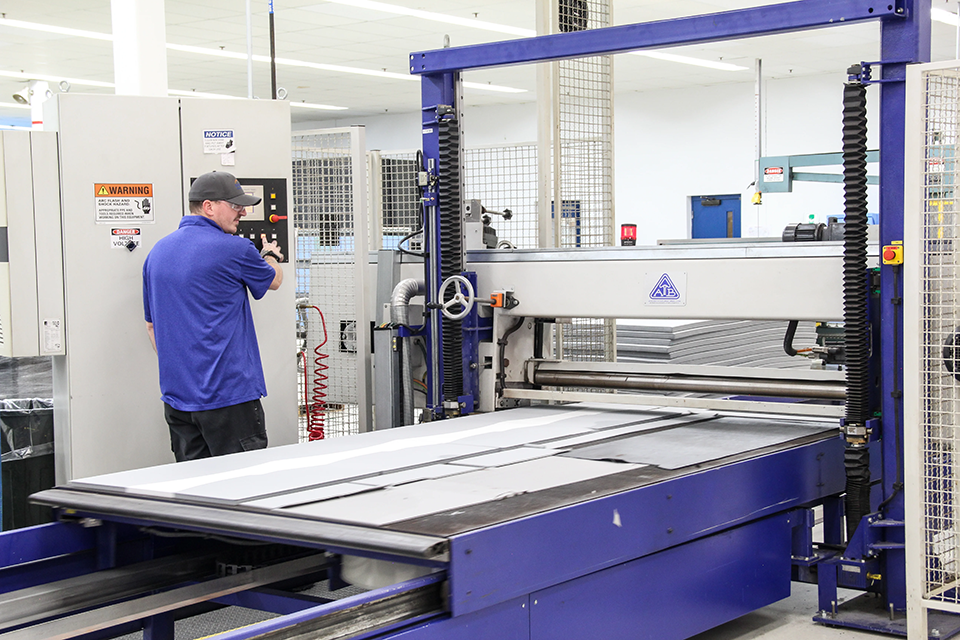 A man working in a medical device manufacturing facility. 