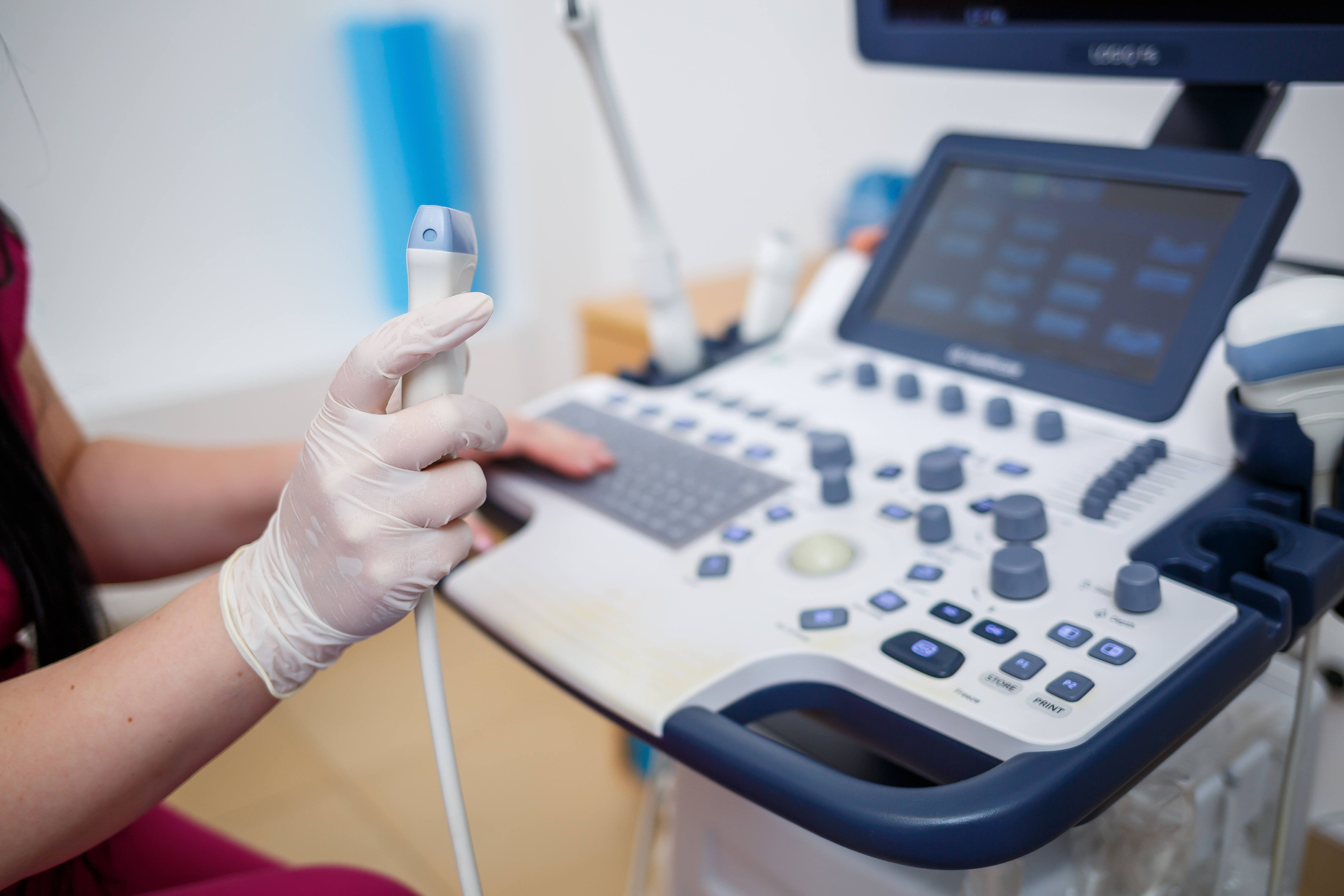 A transvaginal ultrasound exam beginning to take place. 