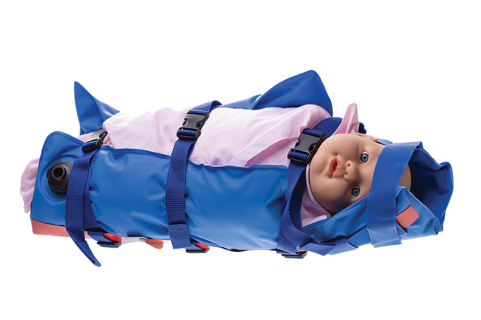 A child in a MedVac immobilizer for an MRI scan