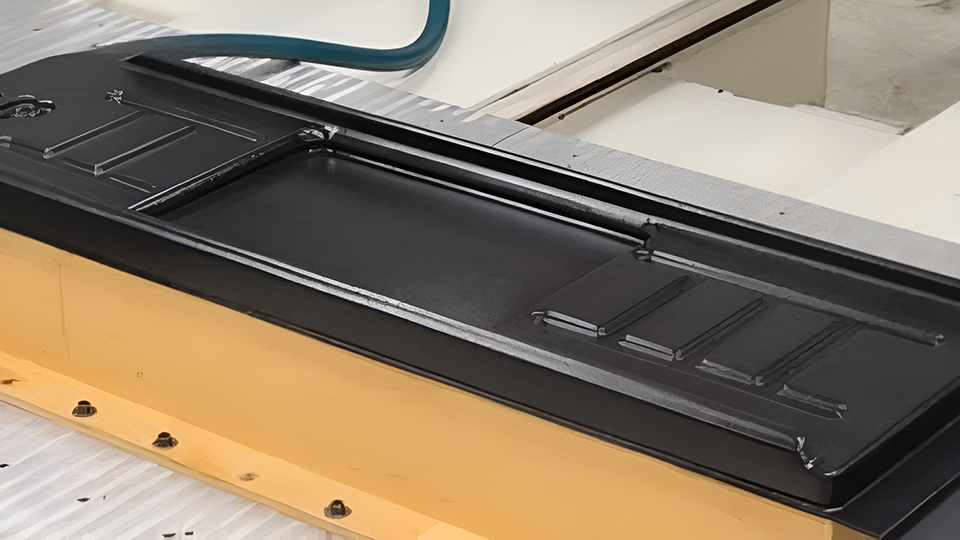 A photo of a vacuum forming chamber.