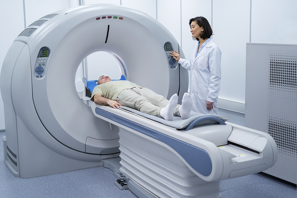 A doctor getting patient ready for a ct scan
